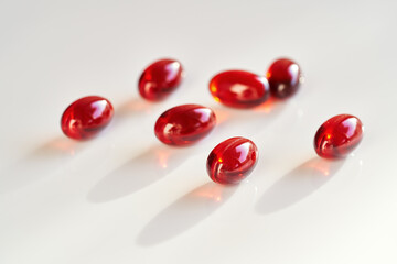 Krill oil capsules on a bright background