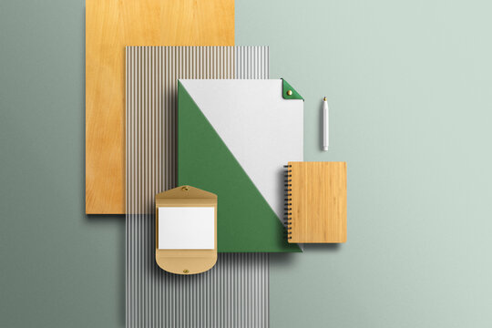 Branding stationery clean mockup template, with reeded glass and wooden elements, real photo, business card, envelope, folder. Blank isolated on a green background to place your design.	