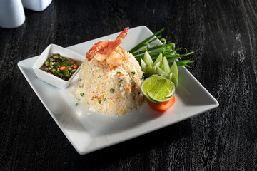 Close up view of shrimps with rice on grey back