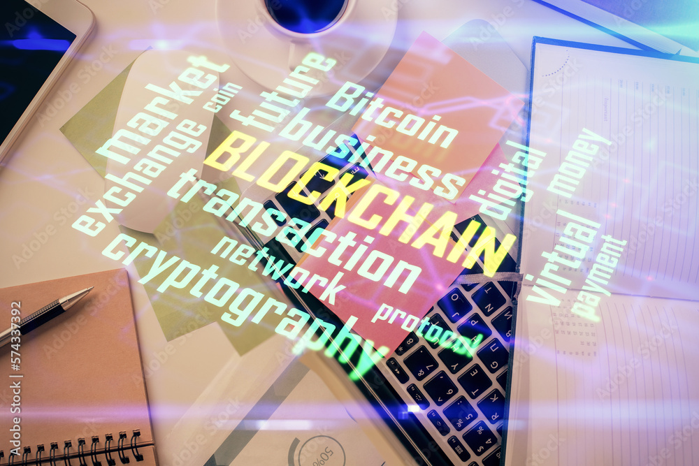 Poster Blockchain theme hologram drawings over computer on the desktop background. Top view. Multi exposure. Concept of cryptoeconomy.