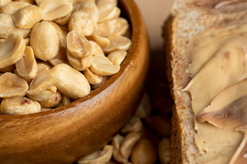 Peeled and roasted peanuts on the table
