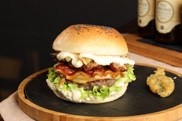 tasty beef sandwich in black background	