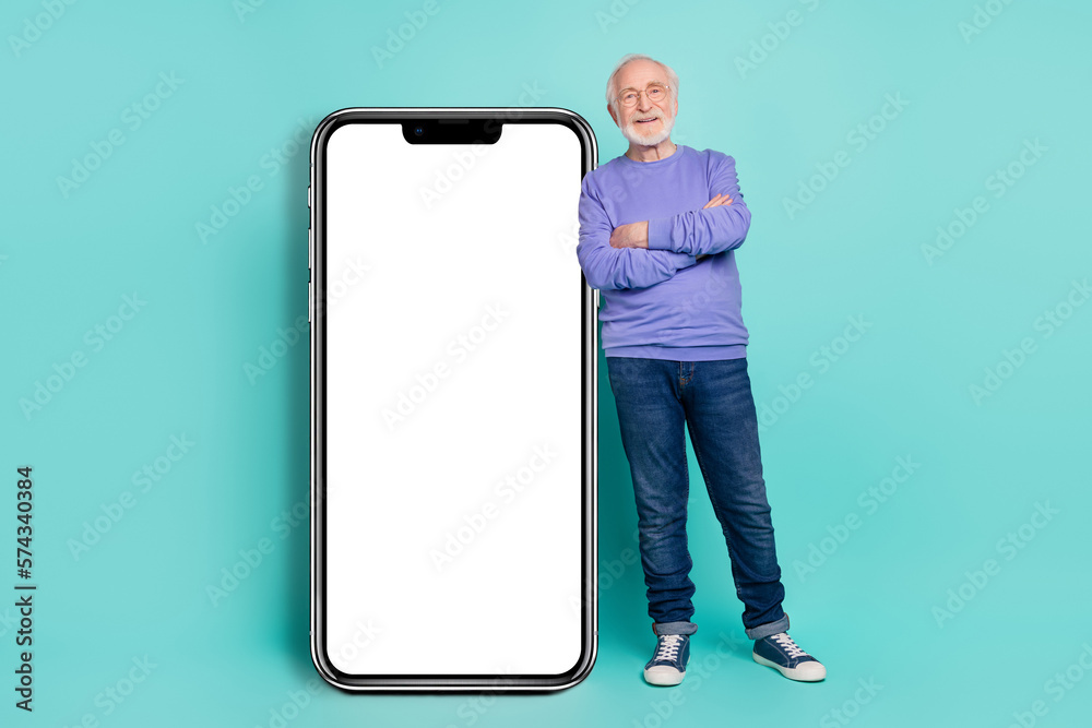 Poster full size photo of successful positive person crossed arms stand near huge empty space phone isolate