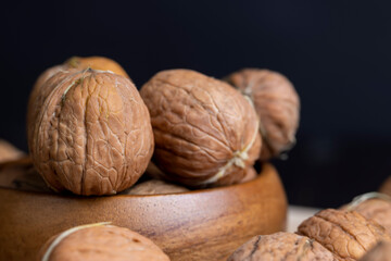 Unpeeled walnut harvest on the table