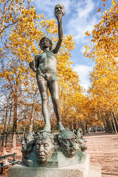 The Mask Seller statue by Zacharie Astruc in the Luxembourg garden in Paris, France in Autumn
