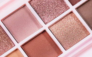 Beige eye shadow palette top view. Decorative cosmetics. Beauty products. Nude brown eye shadow.