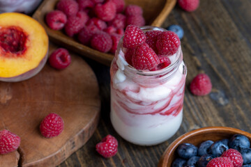 Fresh delicious milk yogurt with raspberry flavor
