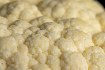 Cauliflower close up during cooking, fresh raw cauliflower