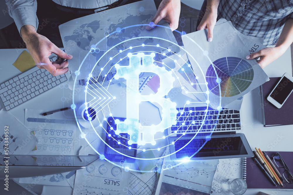 Poster double exposure of man and woman working together and crypto theme hologram drawing. computer backgr