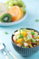 A bowl with fresh fruit salad	