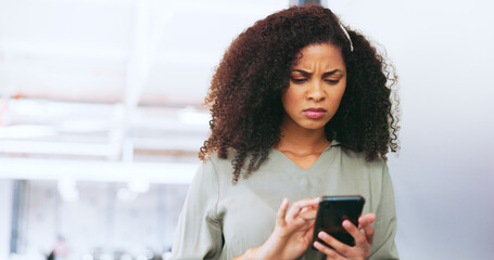 Sad, reading communication and black woman on mobile app, email and website with phone in an...