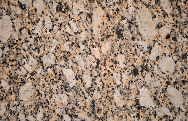 Polished marble stone surface translator with brown, black, beige and gray colors
