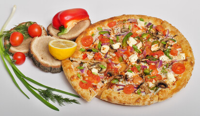 pizza with tomatoes and olives , with cheese, vegetables, mushrooms, round. Lemon, paprika, tomatoes, green onions, dill on original wooden stands.