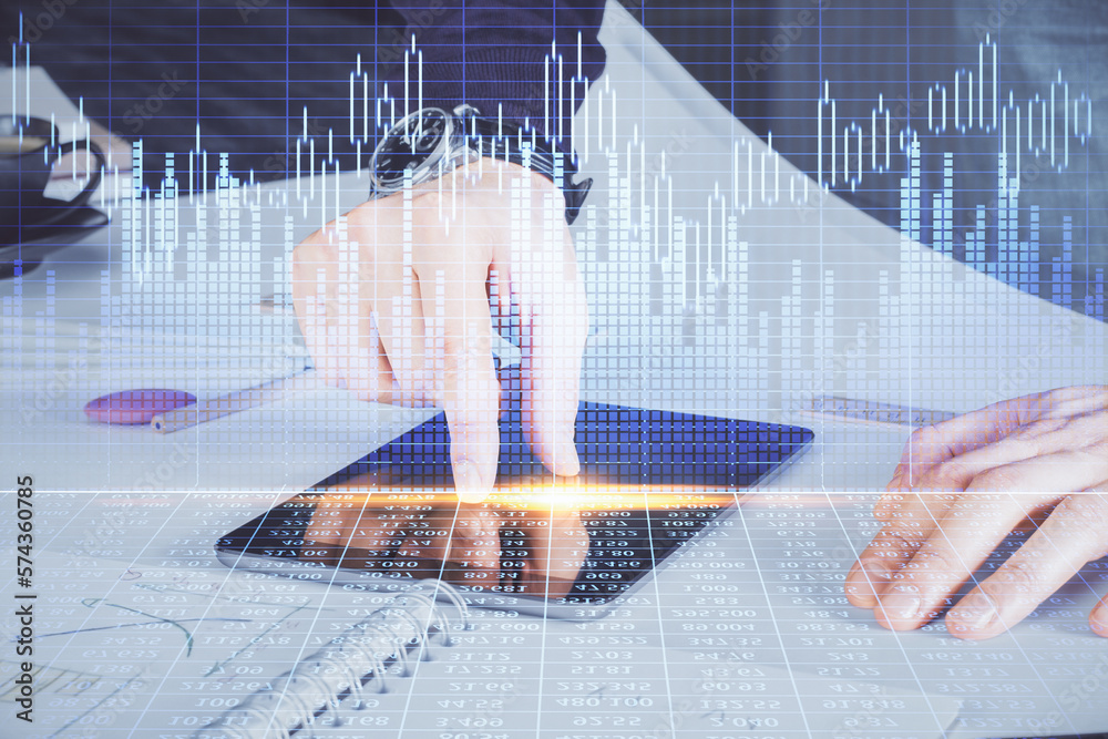 Poster double exposure of man's hands holding and using a digital device and forex graph drawing. financial