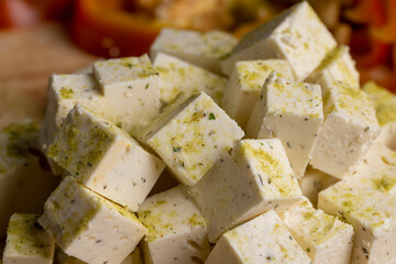 sliced white cottage cheese with spices