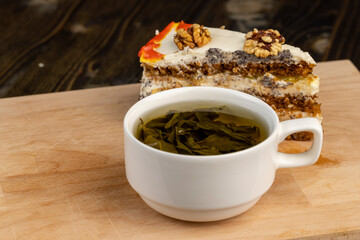 a cut piece of multi-layered honey cake with creamy filling