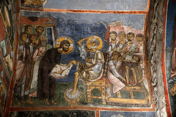 Ceiling fresco in Panagia tis Asinou byzantine church. Jesus washing Saint Peter's feet. Cyprus. - obrazy, fototapety, plakaty