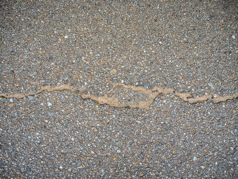 imagen detalle textura suelo de asfalto con marcas de barro