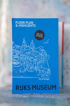 Amsterdam, Netherlands - February 10, 2023: Rijksmuseum brochure vertical.