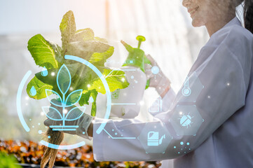 Scientists are spraying water mixed with experimental organic fertilizers on...