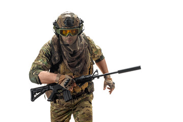 A hired soldier with an automatic rifle running right on the camera.