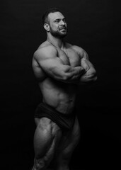 Obraz na płótnie Canvas Fitness male model posing