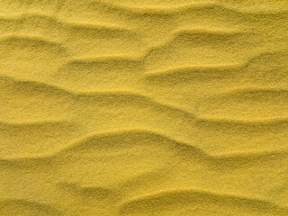 sand texture as a background. sand of desert. yellow sand for designers