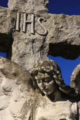 Obraz premium stone sculpture of a sad angel