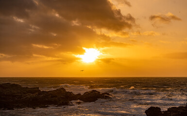 Rough seas at sunset on the Isle of Anglesey