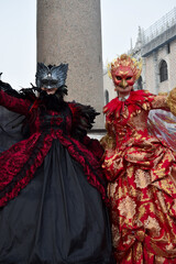 Fototapeta na wymiar Couple of people dressed up for the Venice Carnival