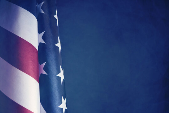 Flag United States America dark blurry background.Banner of America retro style.