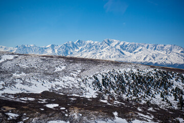 View from a repeater on snowy tops of Altai mountains near Aktash town, Russia