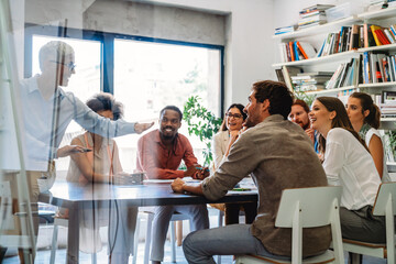 Group of multiethnic business people working together on conference and meeting in modern office