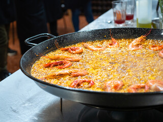 Close-up view of prawns in seafood paella. Traditional Spanish regional cuisine, Valencia.