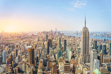 Amazing panorama view of New York city skyline and skyscraper at sunset. Beautiful cityscape in...