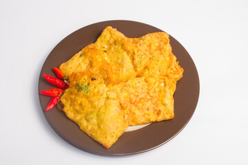 Fried Tempe is Indonesian famous food served with red chilies with white background