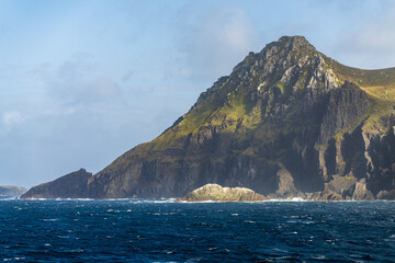 Fototapeta na wymiar Rocky cliffs form Cape Horn on Hornos Island in Chile