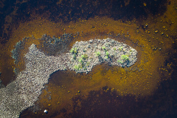 Abstract top down view of a natural lagoon with natural colors