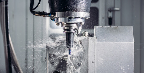 Coseup Working CNC turning cutting metal Industry machine iron tools with splash water © Parilov