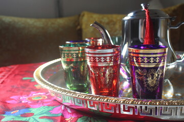 Moroccan tea,Tea pouring into glass from metal teapot