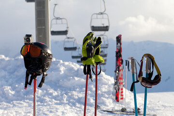 Protective sports equipment on ski poles at ski resort - 574402928