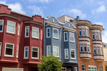 San Francisco, California, USA, June 29, 2022: San Francisco Victorian houses near Washington Square. - obrazy, fototapety, plakaty