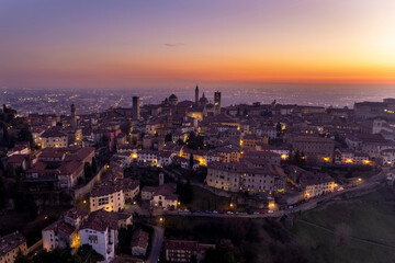 Fototapeta na wymiar High point of view at buildings in Bergamo Alta during dusk, Lombardy Italy.