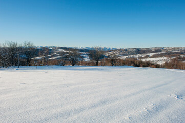 Fototapeta na wymiar Winter landscape in the mountains, snowy winter landscapes, frosty mornings