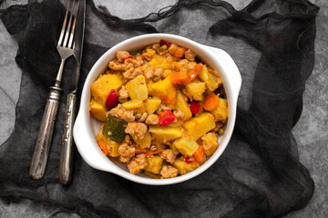 Vegan stew soy meat and vegetables in bowl