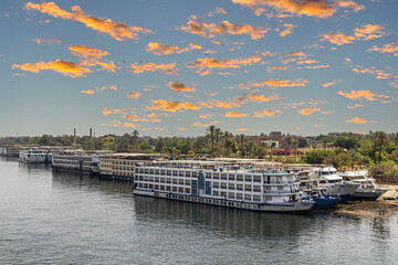 Cruise ships on the Nile river anchored in the port. Luxor, Egypt