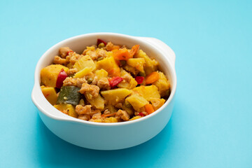 Vegan stew soy meat and vegetables in bowl