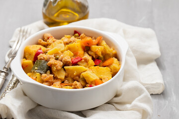 Vegan stew soy meat and vegetables in bowl