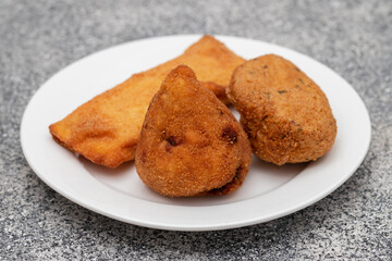 Typical portuguese snack fried entrance on plate