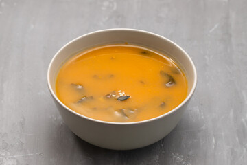 Vegetable cream soup with spinach in small bowl